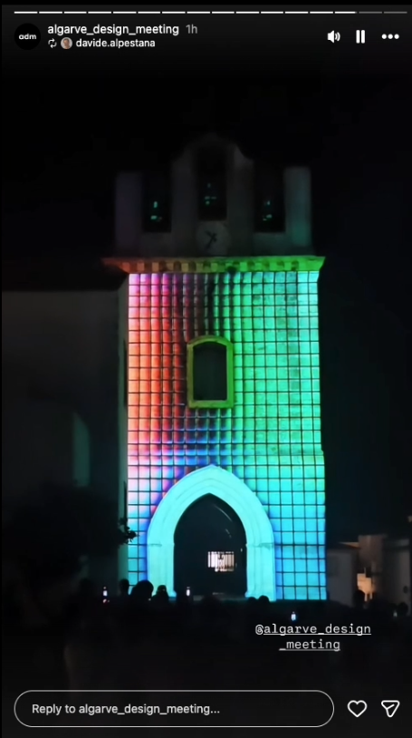 Faro Cathedral illuminated with a colourful grid pattern